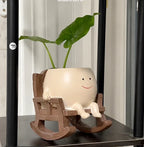 Gyngende blomsterpotte