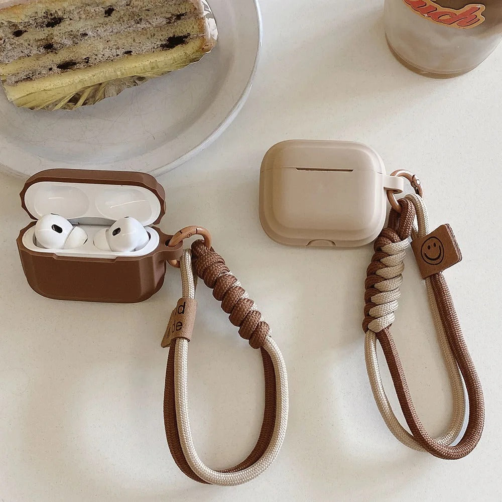 Brunt skyddsfodral för AirPods med flätad handledsrem