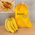 Gul bananpåse med dragsko i köksmiljö
